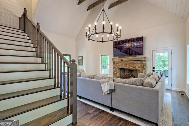 a porch with a table and chairs