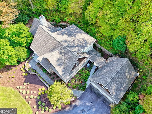 a front view of house with yard and outdoor seating