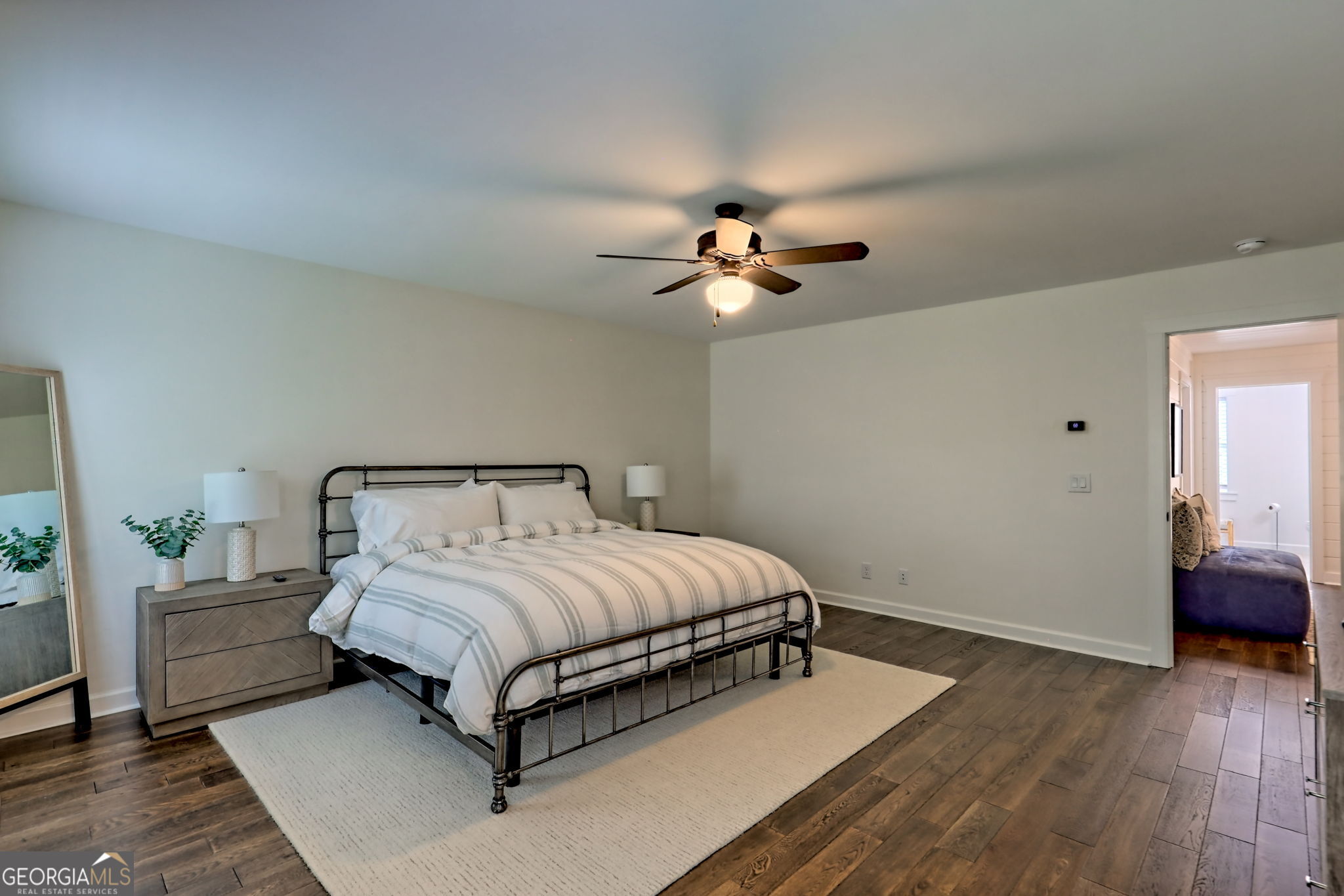 571 Ledford Road Dillard, GA 30537 - Photo 55 of 78 a bedroom with a bed and a chandelier