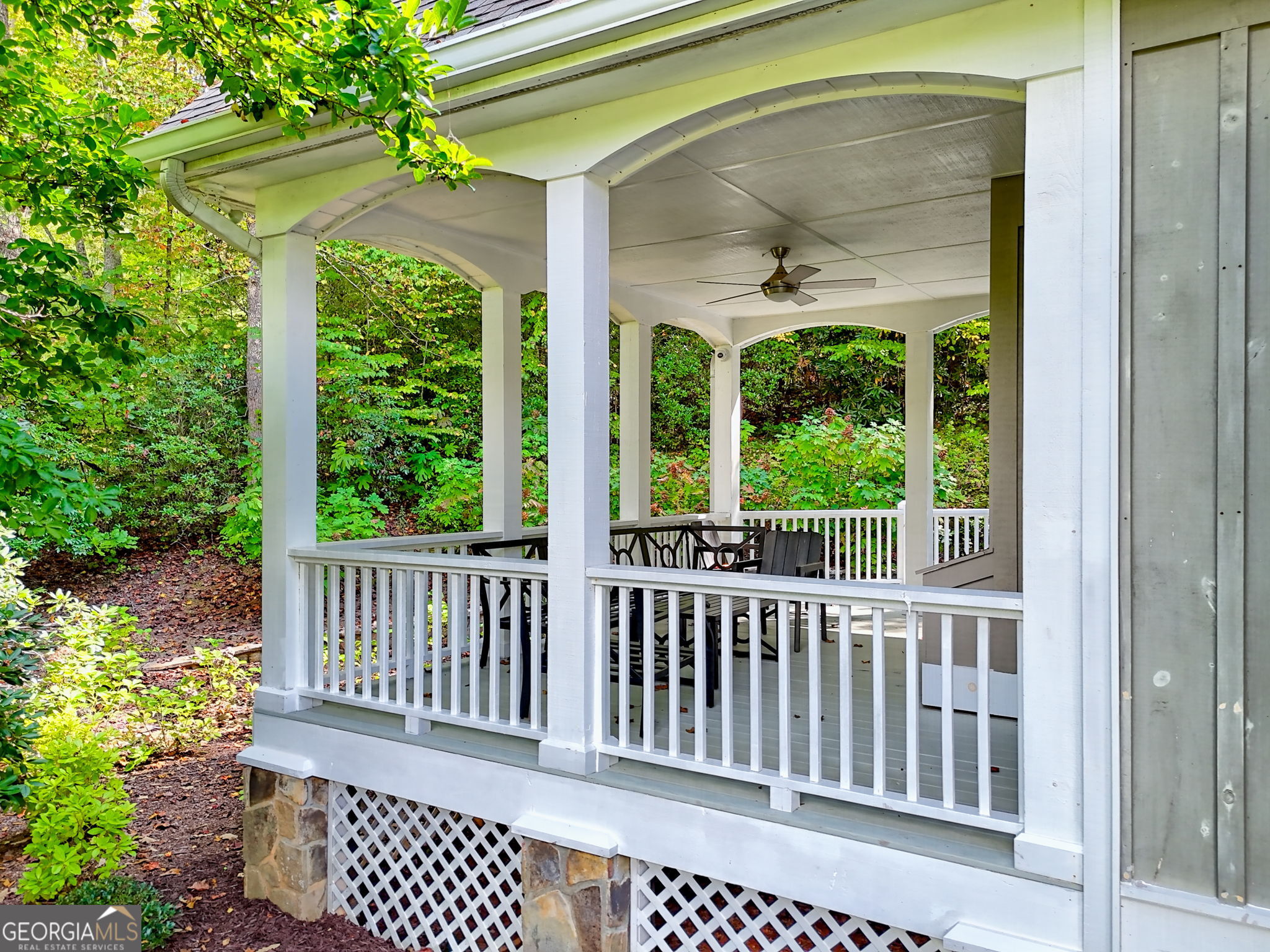 571 Ledford Road Dillard, GA 30537 - Photo 75 of 78 a porch with a table and chairs