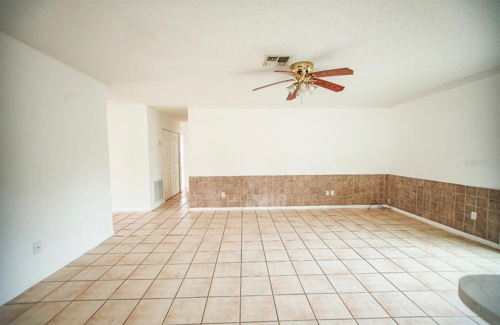 606 Water Road Ocala, FL 34472 - Photo 8 of 34 a view of a room with white walls