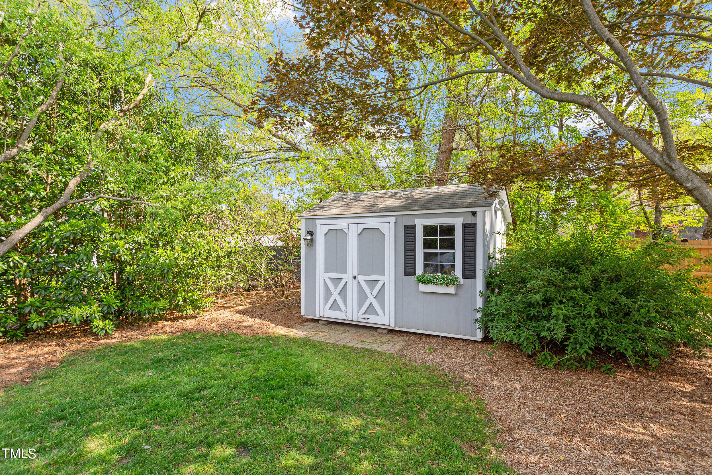 3316 Blue Ridge Road Raleigh, NC 27607 - Photo 28 of 35 a view of a house with backyard and garden