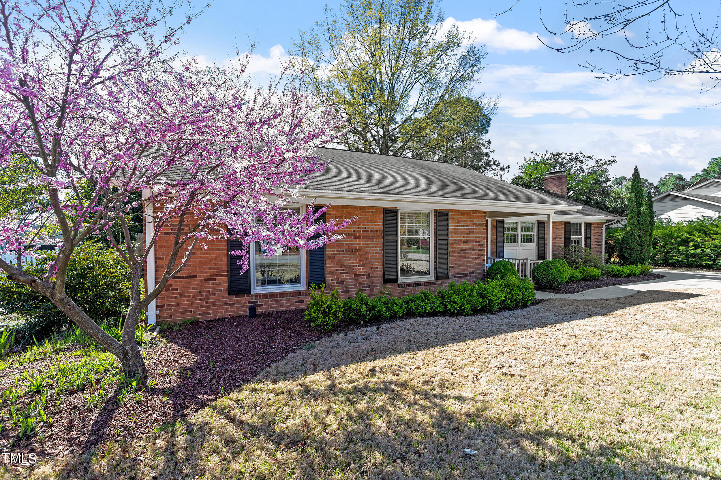 3316 Blue Ridge Road Raleigh, NC 27607 - Photo 35 of 35 a front view of a house with garden