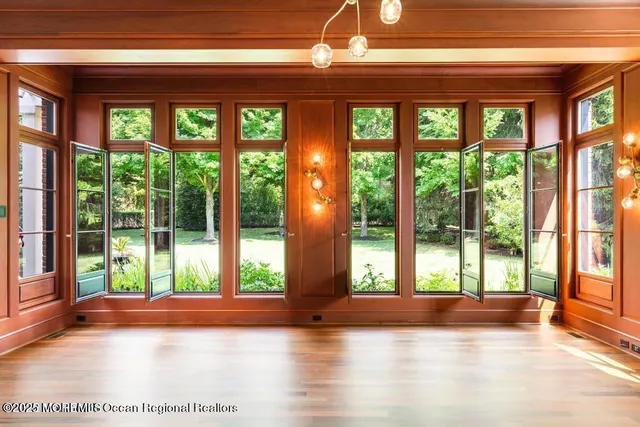 a view of a hallway view with staircase