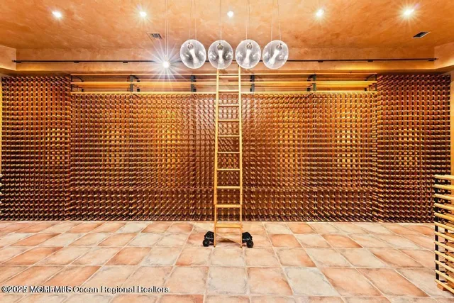 a view of empty room with wooden floor and fireplace
