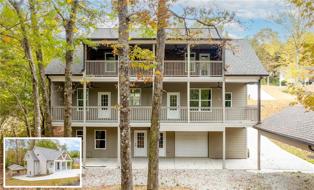 1713 Cagle Court Lawrenceville, GA 30045 - Photo 2 of 50 a front view of a building with a garden