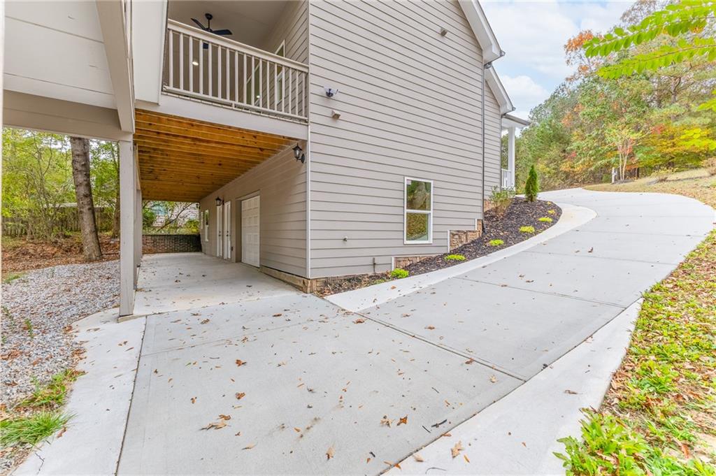 1713 Cagle Court Lawrenceville, GA 30045 - Photo 4 of 50 a view of a house with a backyard