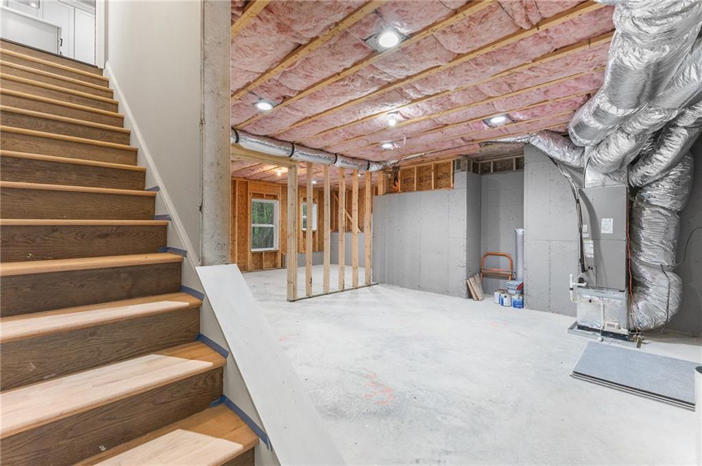1713 Cagle Court Lawrenceville, GA 30045 - Photo 41 of 50 a view of staircase with white walls