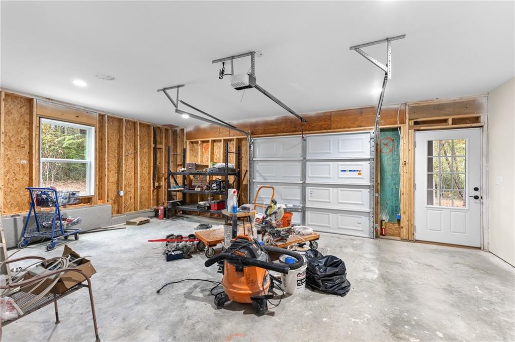 1713 Cagle Court Lawrenceville, GA 30045 - Photo 46 of 50 a room with gym equipment and large window