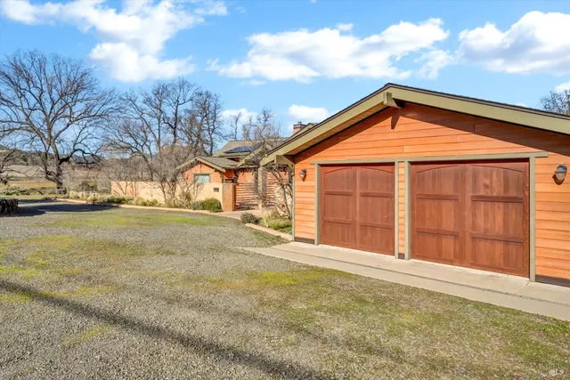a view of a house with a big yard
