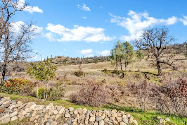 a view of a yard with mountain view