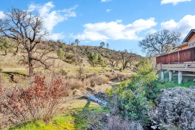 a view of lake with mountain
