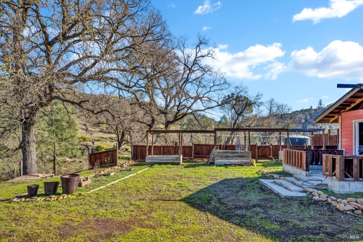 1900 Stagecoach Canyon Road Pope Valley, CA 94567 - Photo 51 of 70 a front view of a house with a yard