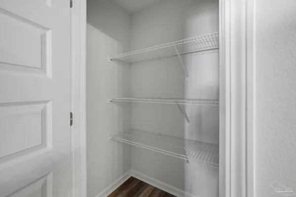 a empty closet with white paint