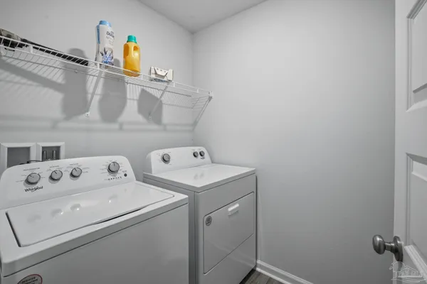 a utility room with dryer and washer