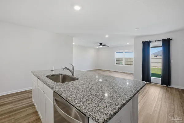 a kitchen with a sink and faucet