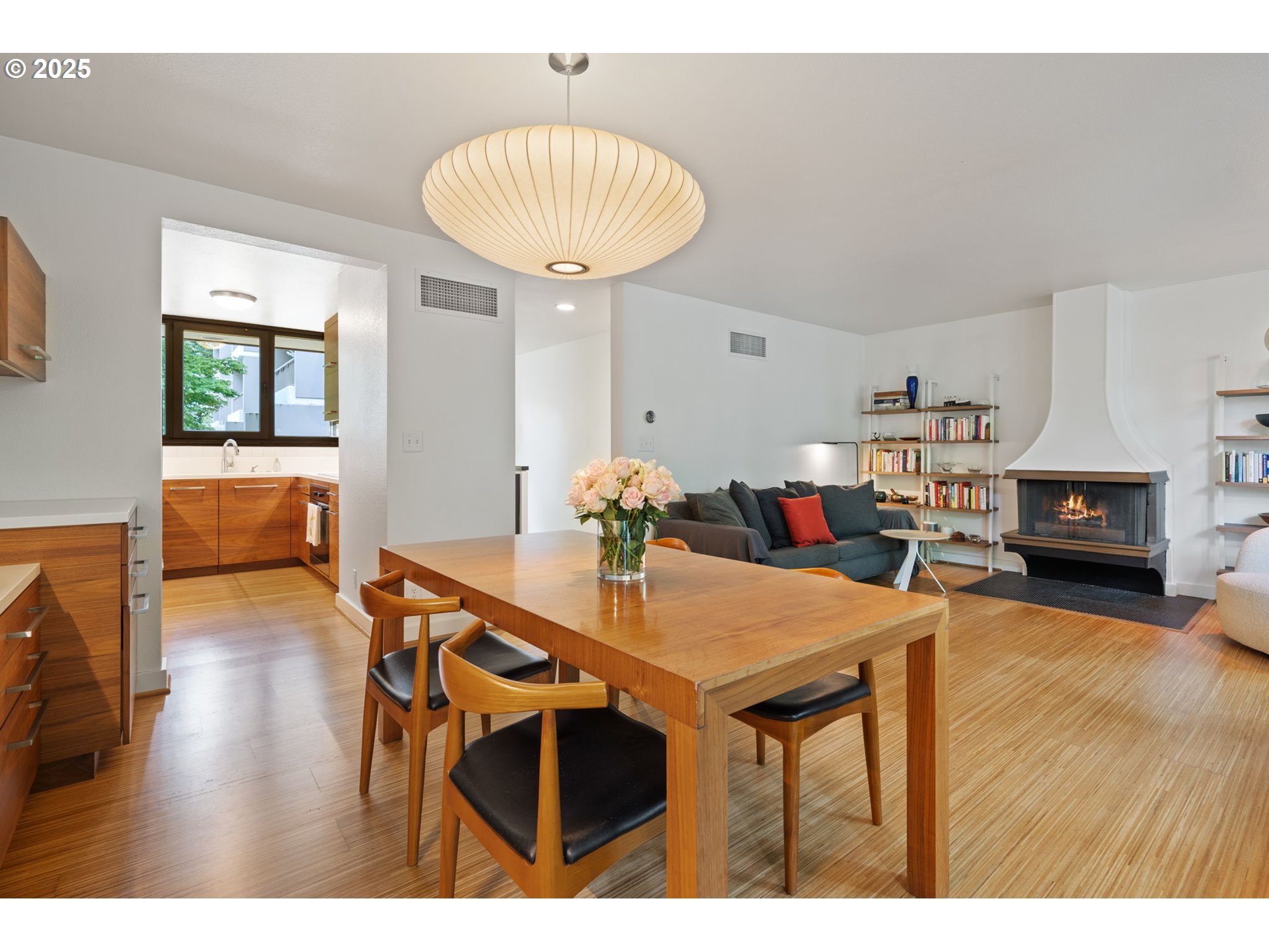 255 Southwest Harrison Street, Unit TH5 Portland, OR 97201 - Photo 12 of 40 a view of a dining room with furniture and wooden floor