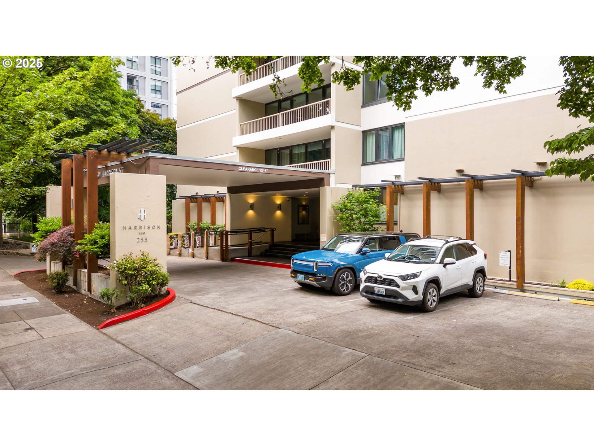 255 Southwest Harrison Street, Unit TH5 Portland, OR 97201 - Photo 33 of 40 a view of street with parked cars
