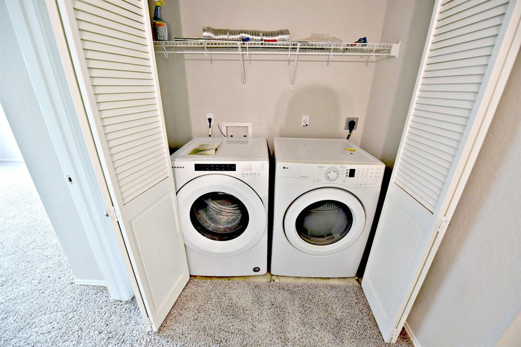 14815 Avery Ranch Boulevard, Unit 702 Austin, TX 78717 - Photo 17 of 19 Clothes washing area featuring light colored carpet, laundry area, and independent washer and dryer