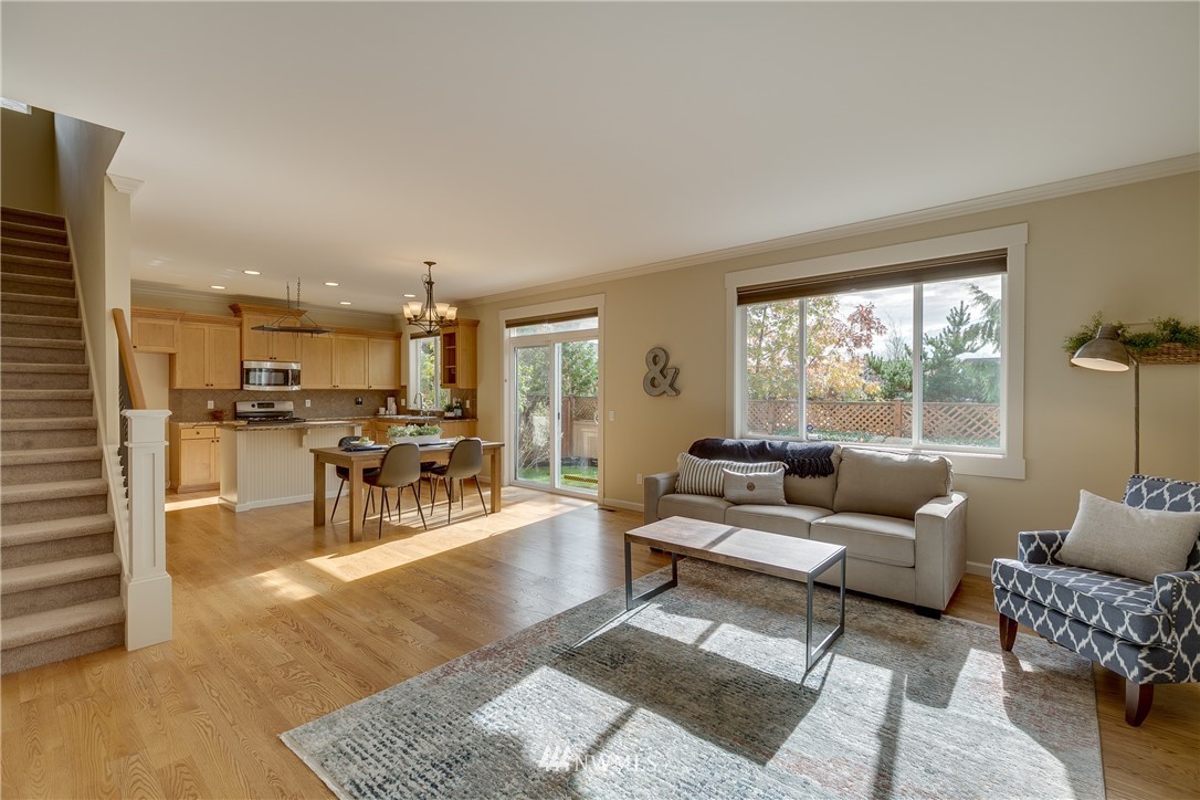 1532 170th Street Southeast Bothell, WA 98012 - Photo 11 of 39 a living room with furniture and a large window