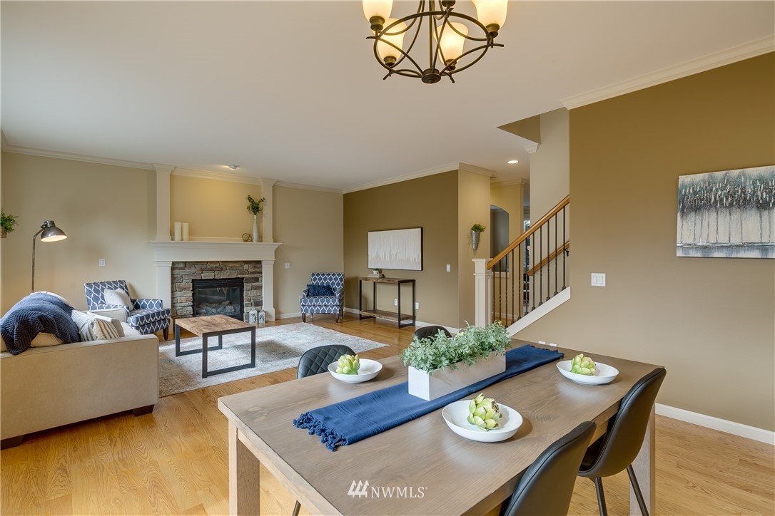 1532 170th Street Southeast Bothell, WA 98012 - Photo 13 of 39 a living room with furniture and a fireplace