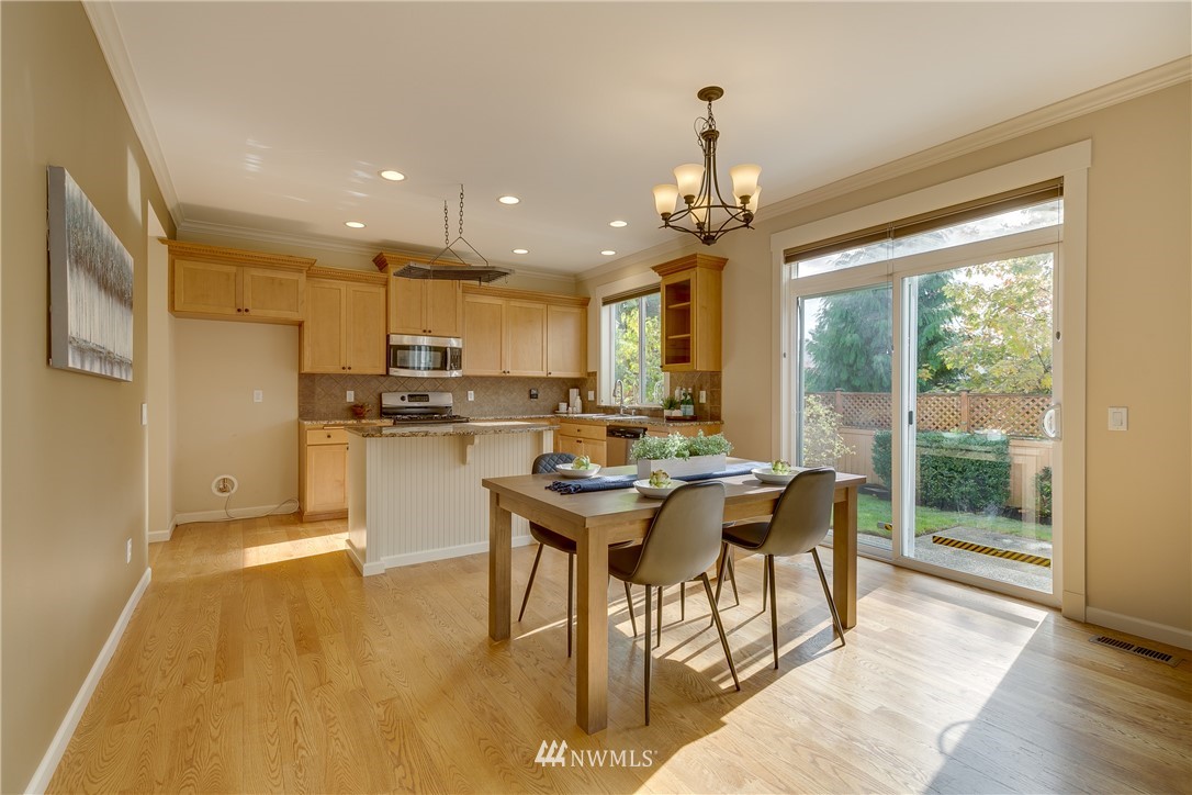 1532 170th Street Southeast Bothell, WA 98012 - Photo 14 of 39 a view of a dining room with furniture window and outside view