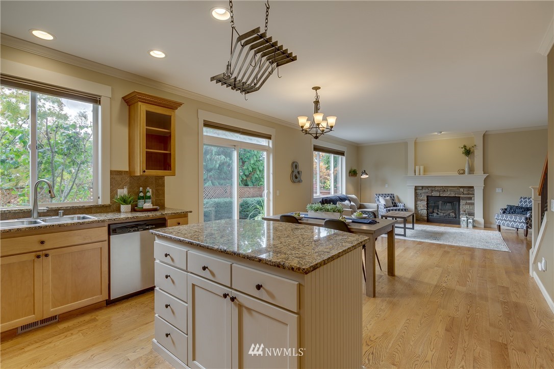 1532 170th Street Southeast Bothell, WA 98012 - Photo 17 of 39 a kitchen with sink stove and cabinets