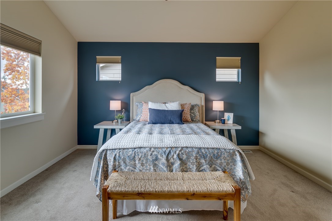 1532 170th Street Southeast Bothell, WA 98012 - Photo 19 of 39 a bedroom with a bed and window
