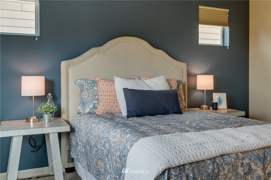 1532 170th Street Southeast Bothell, WA 98012 - Photo 21 of 39 a bedroom with a bed and a table in it
