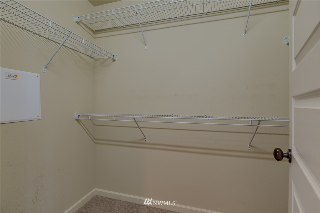 1532 170th Street Southeast Bothell, WA 98012 - Photo 23 of 39 a view of a room with racks on the wall
