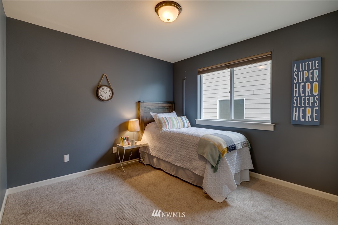 1532 170th Street Southeast Bothell, WA 98012 - Photo 29 of 39 a bedroom with a bed and a window
