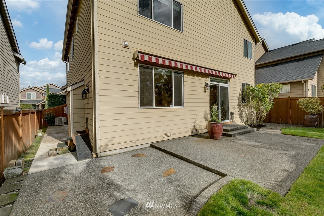 1532 170th Street Southeast Bothell, WA 98012 - Photo 37 of 39 a view of a house with backyard and sitting area