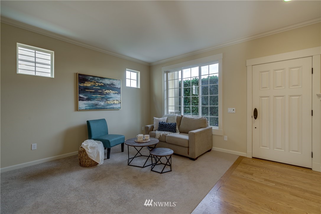 1532 170th Street Southeast Bothell, WA 98012 - Photo 6 of 39 a living room with furniture and a window