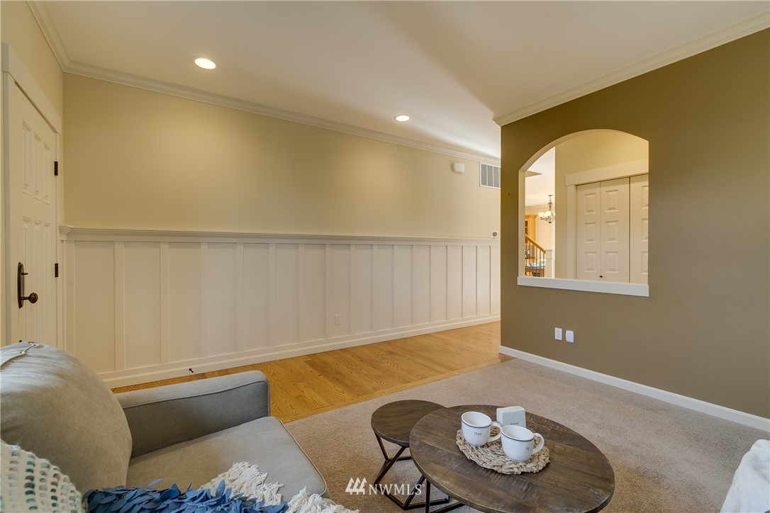 1532 170th Street Southeast Bothell, WA 98012 - Photo 7 of 39 a living room with furniture and a window