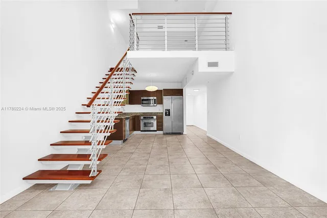 a view of an entryway with staircase