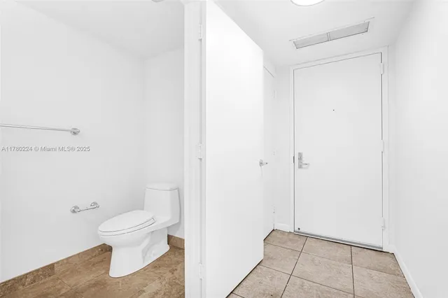 a bathroom with a tub and a shower