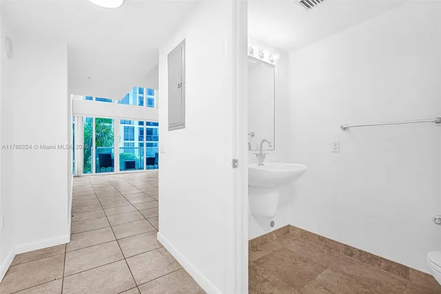 a bathroom with a white bath tub