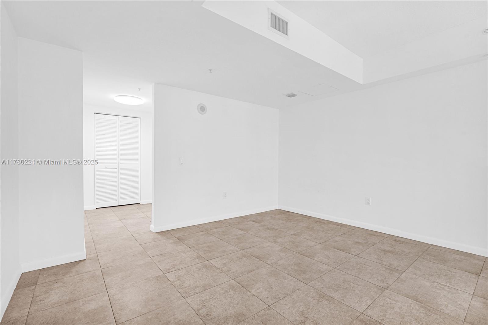 41 Southeast 5th Street, Unit 406 Miami, FL 33131 - Photo 30 of 68 an empty room with an empty room