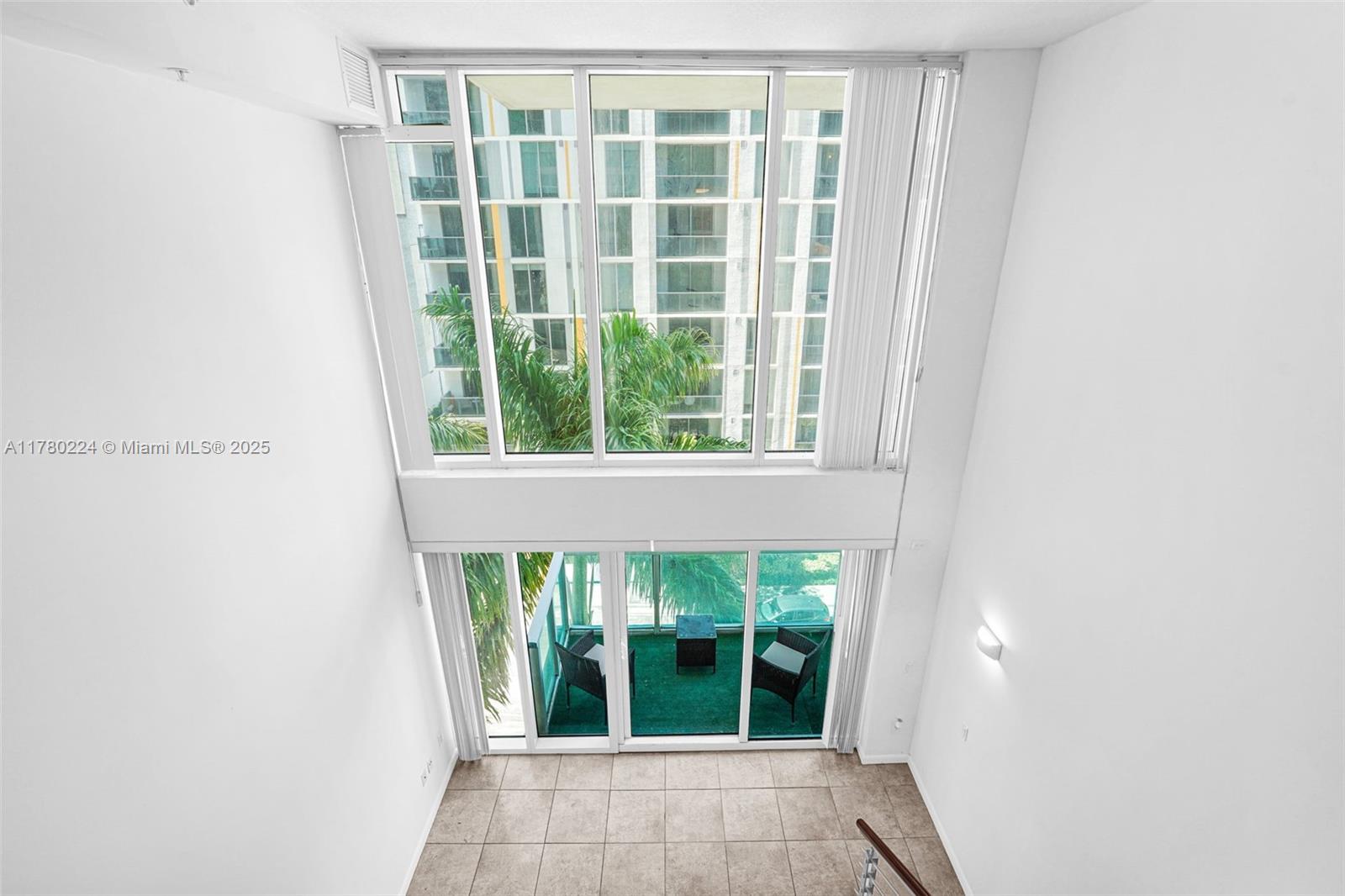41 Southeast 5th Street, Unit 406 Miami, FL 33131 - Photo 33 of 68 a view of a window in an empty room