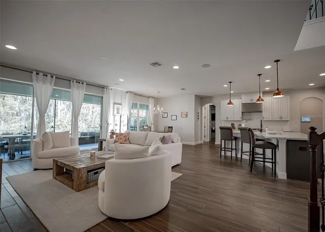 a white stove top oven sitting inside of a kitchen