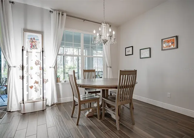 a spacious bedroom with a bed and a couch