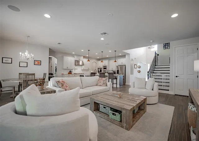 a bathroom with a sink tub and a mirror
