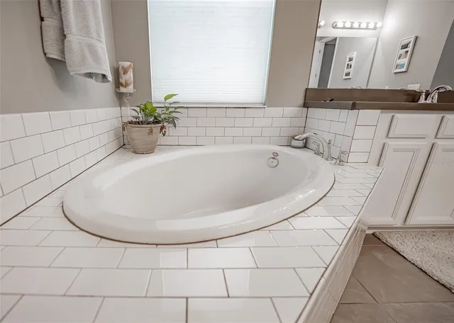 a living room with furniture and white walls