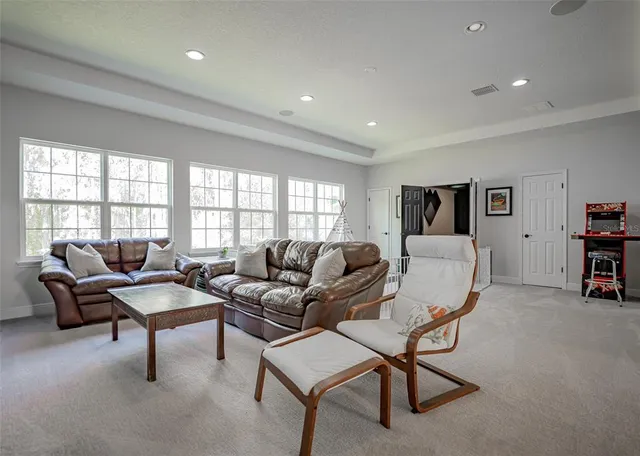 a view of a dining room with furniture window and outside view