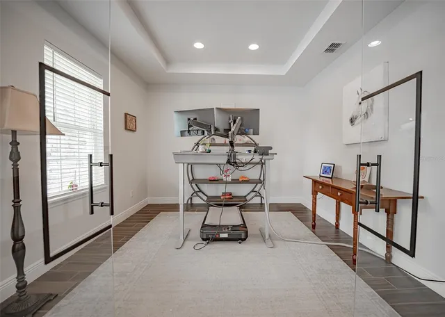 a living room with furniture and a table