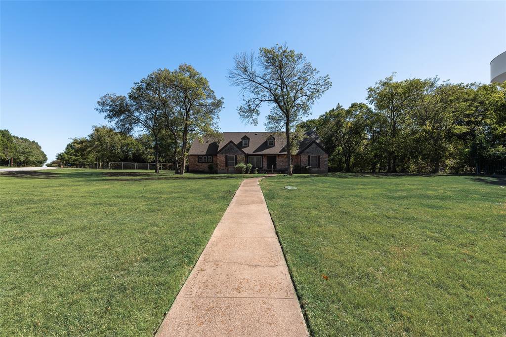 102 South Royal Oak Drive Duncanville, TX 75116 - Photo 2 of 19 a view of a park with large trees