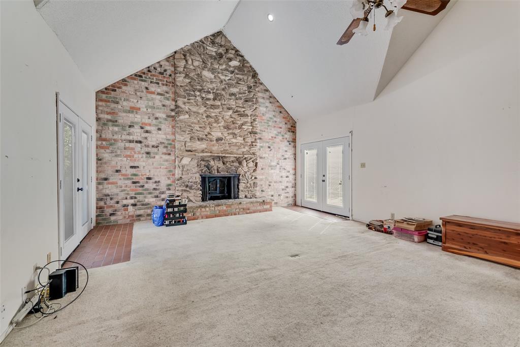 102 South Royal Oak Drive Duncanville, TX 75116 - Photo 7 of 19 an empty room with windows