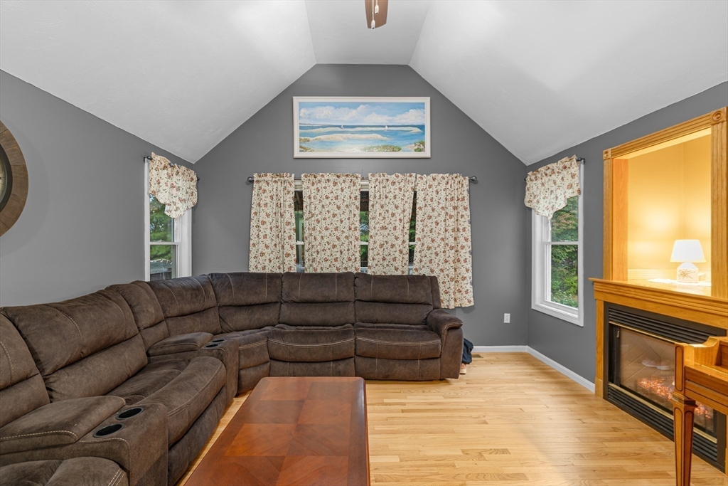 4 Penny Lane Wareham, MA 02558 - Photo 19 of 32 a living room with furniture and a flat screen tv