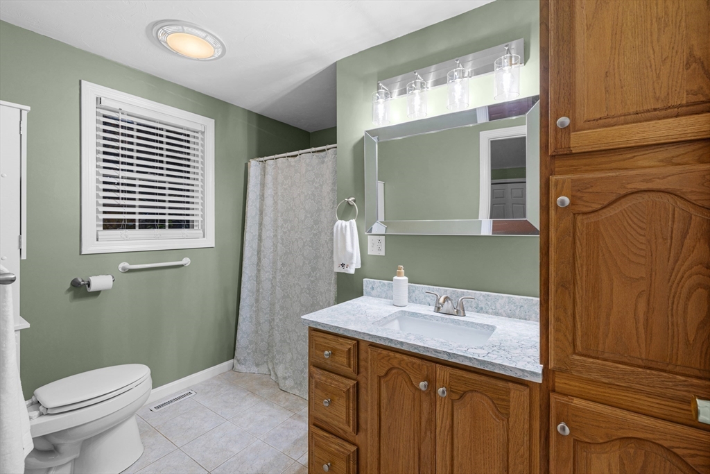 4 Penny Lane Wareham, MA 02558 - Photo 25 of 32 a bathroom with a sink a toilet and shower