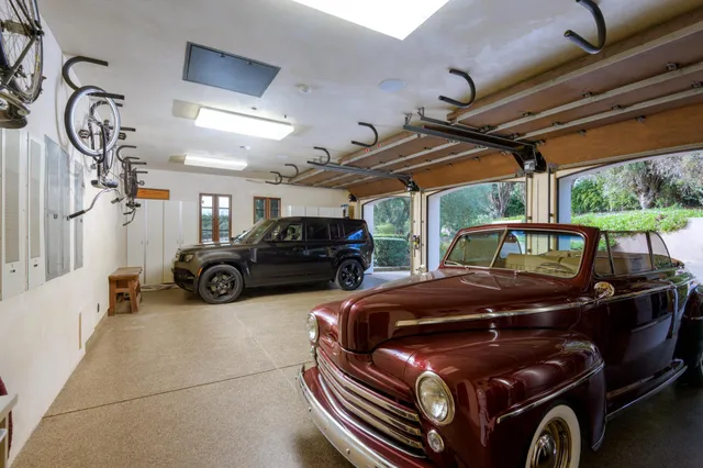 a house with swimming pool in front of it